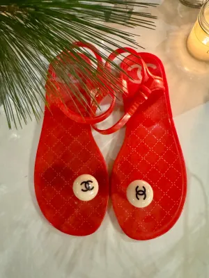 Chanel, red plastic logo flip flops