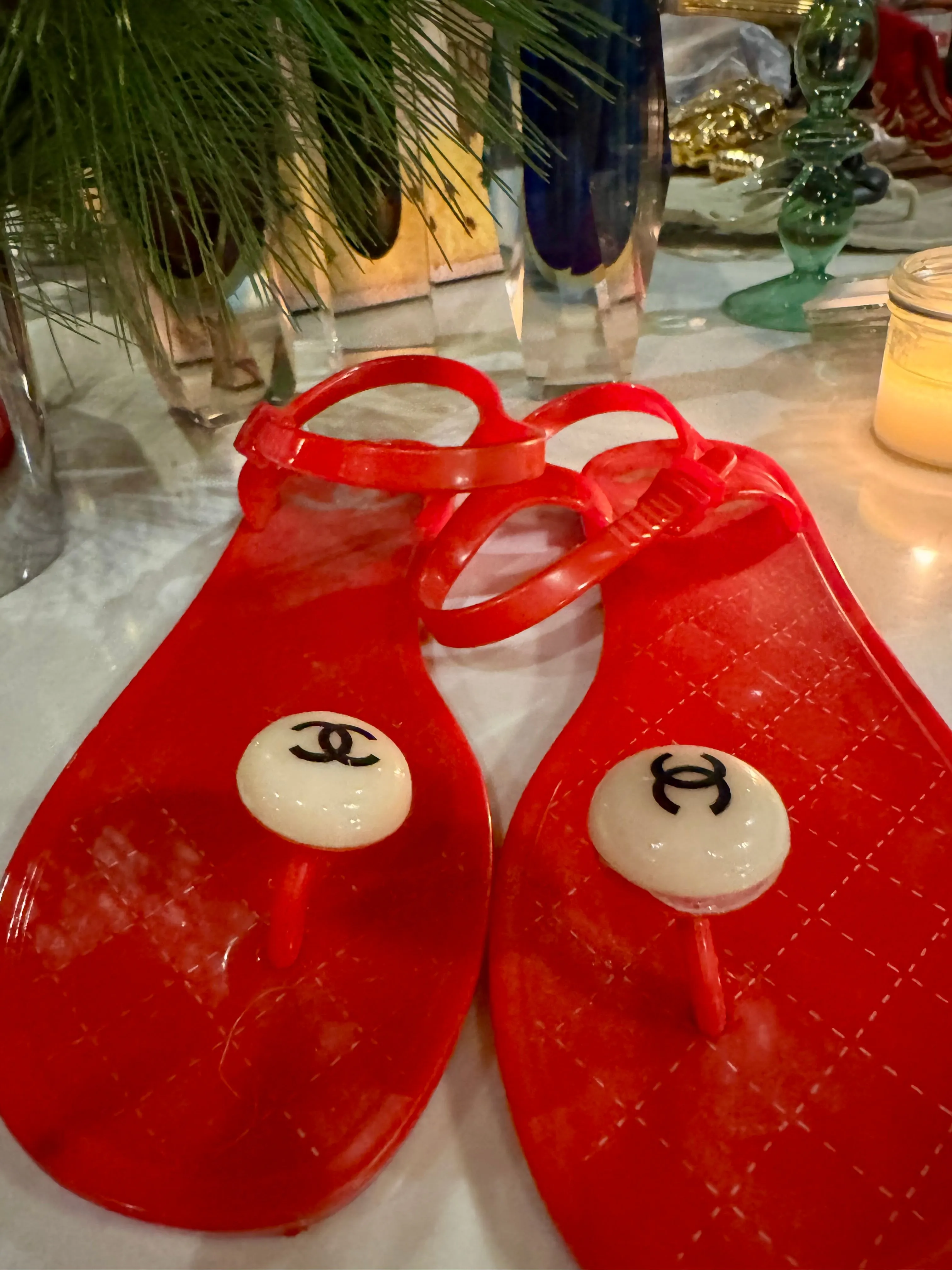 Chanel, red plastic logo flip flops