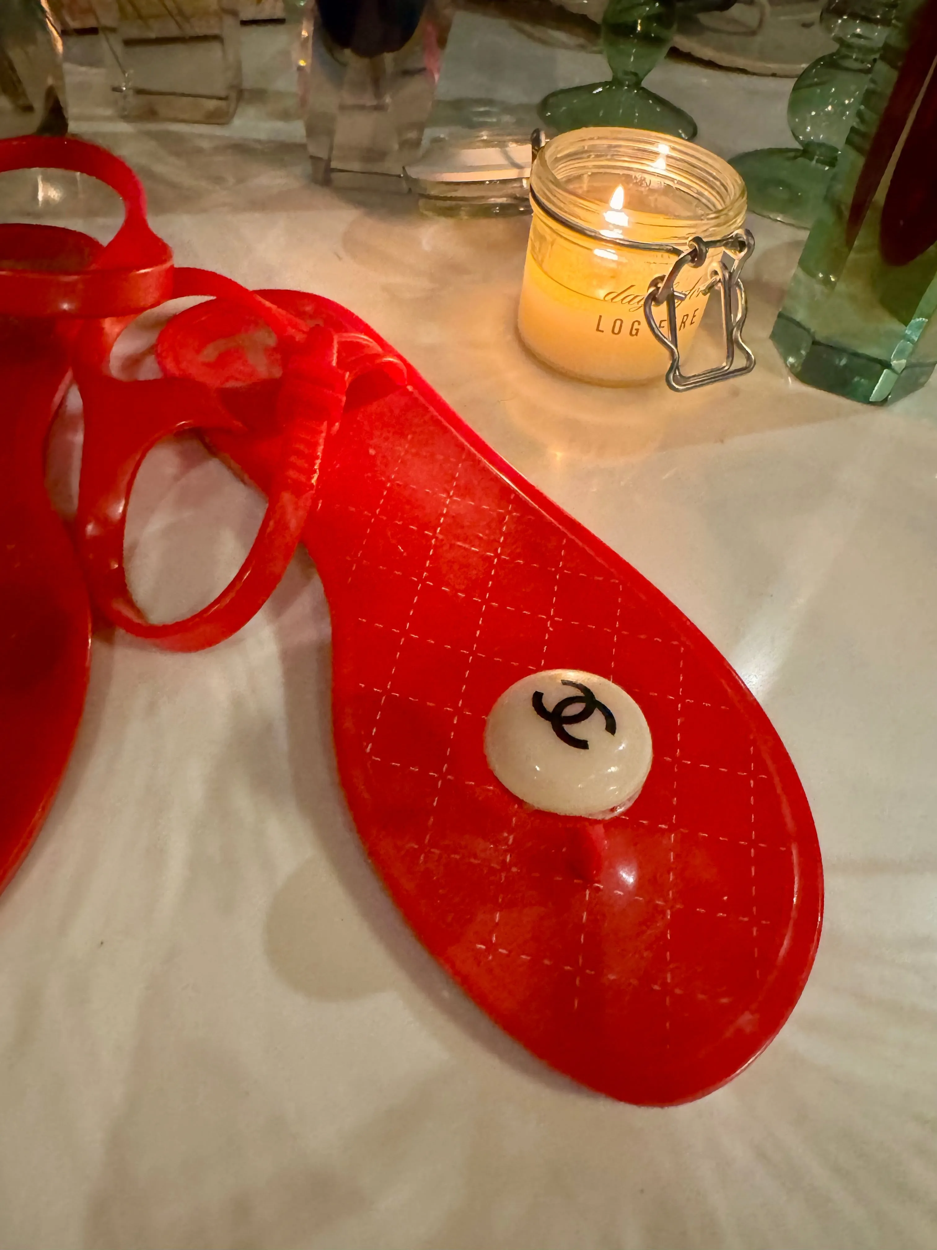 Chanel, red plastic logo flip flops