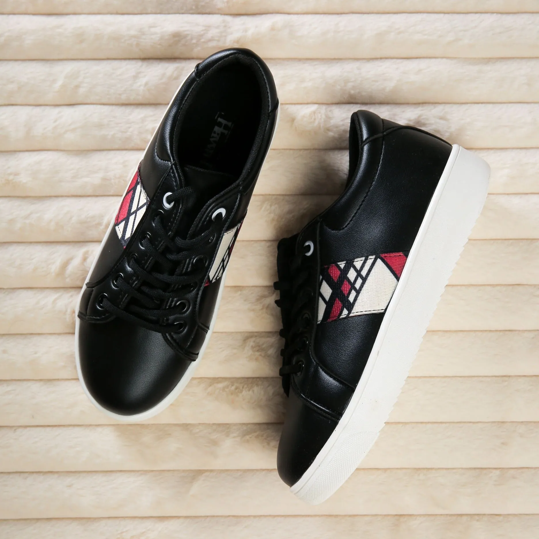 Red side black sneakers