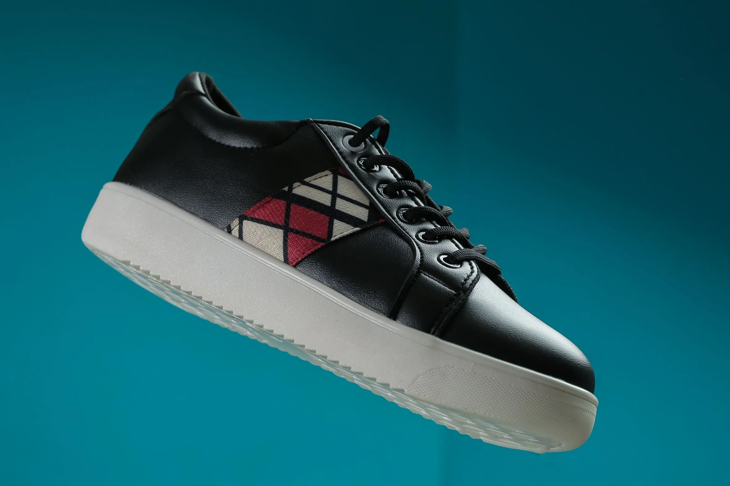 Red side black sneakers