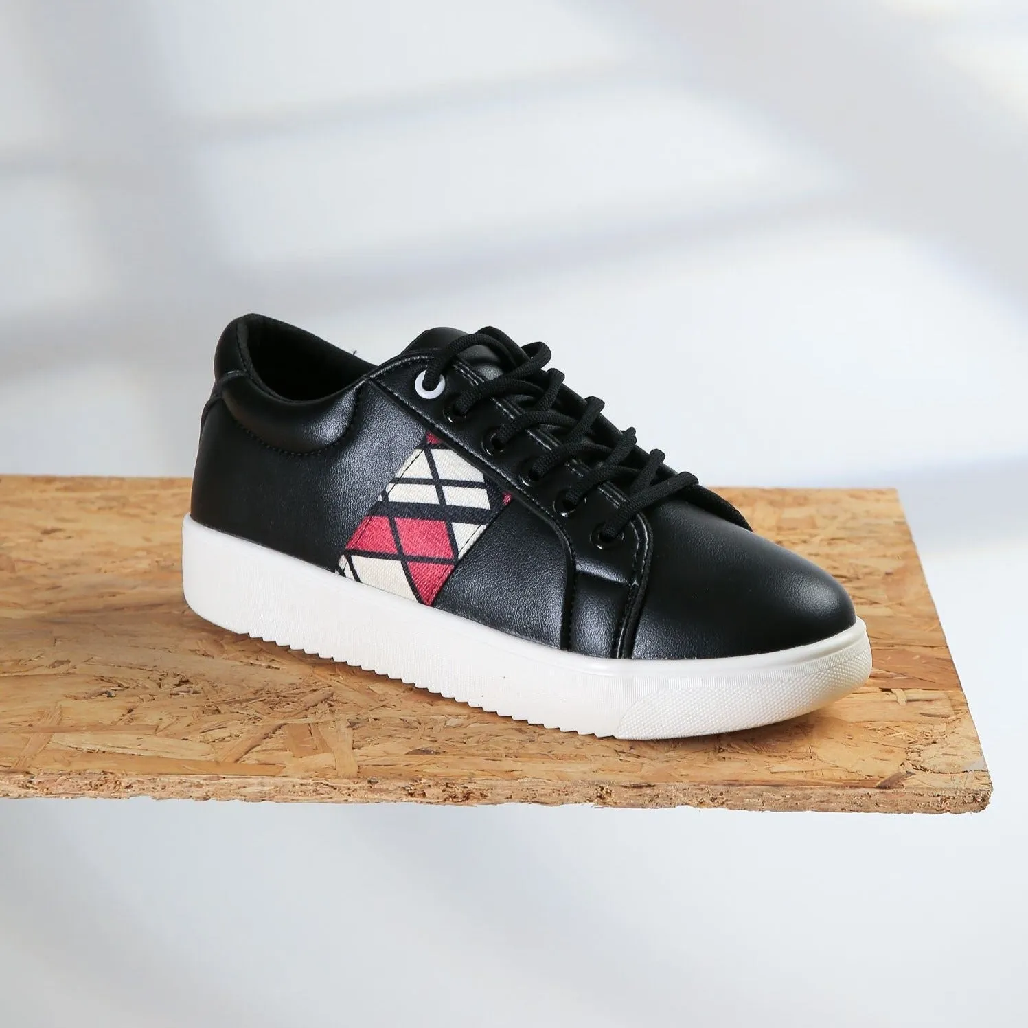 Red side black sneakers